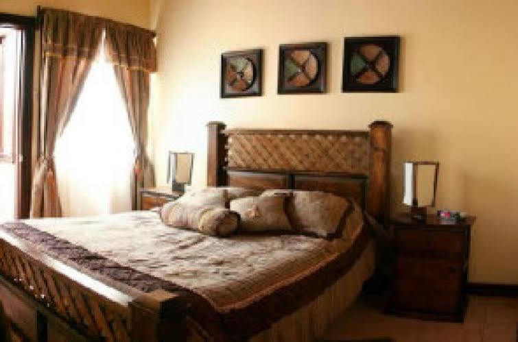 Aparthotel Villa Pacande & Rooms Pilas Bagian luar foto